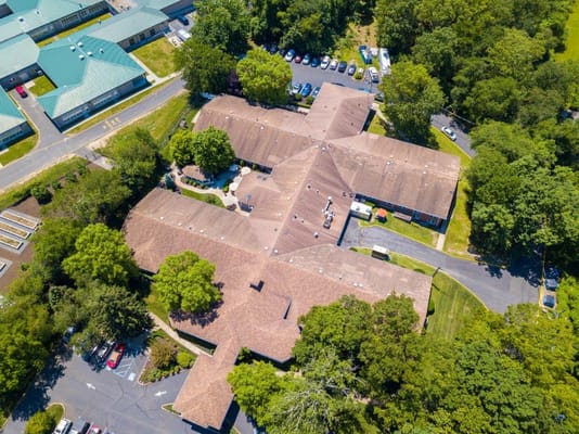 Aerial perspective of Imperial Healthcare Rehabilitation facility surrounded by greenery.