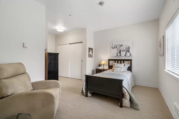 Cozy private resident room with warm decor