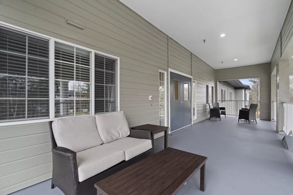 Outdoor seating area on a porch