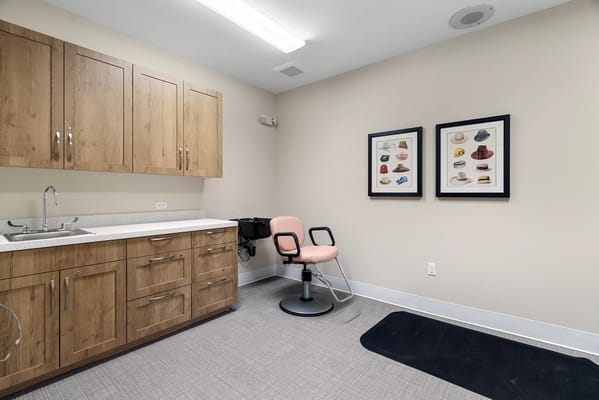 Interior room with cabinets and wall art