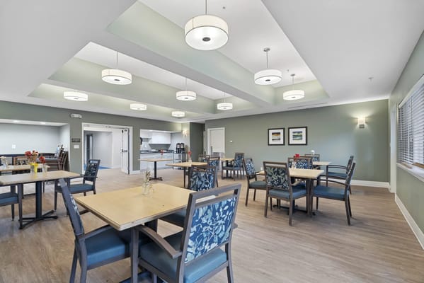 Bright dining room with tables and chairs