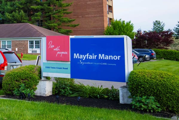 Entrance sign for Mayfair Manor facility