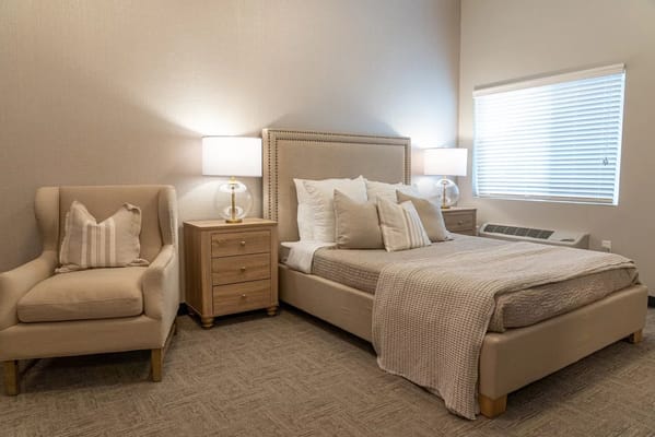 Cozy private bedroom in a senior living facility