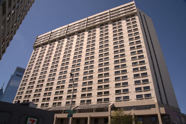 Exterior view of a tall senior living facility