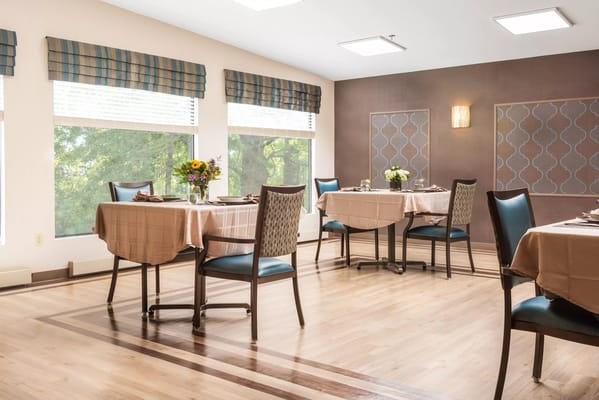 Dining area with tables set for a meal