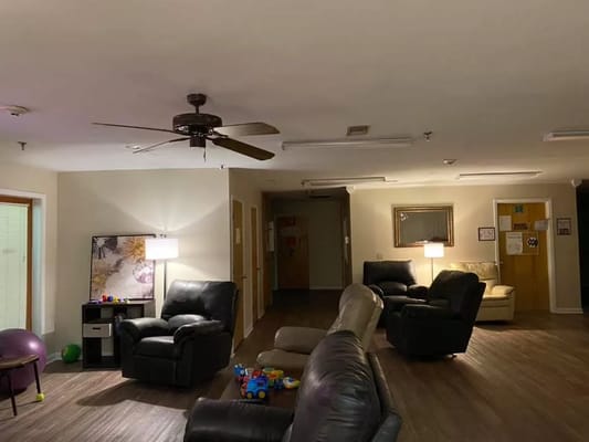 Common area with seating and lamps in the facility