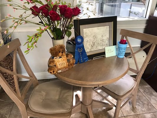 Cozy common area with a small table and decorations