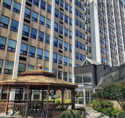 Exterior view of the facility with a gazebo and entrance