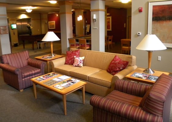 Comfortable living room with sofas and armchairs