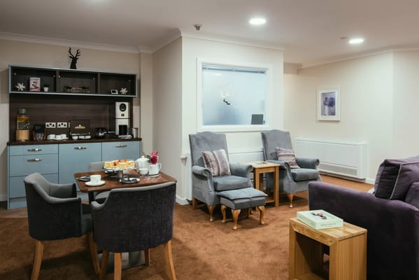 Cozy common area with seating and refreshments