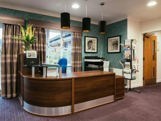 Reception area with desk and seating