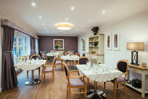 Dining room set up for meals with elegant decor