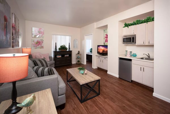 Bright and inviting common area with furnishings