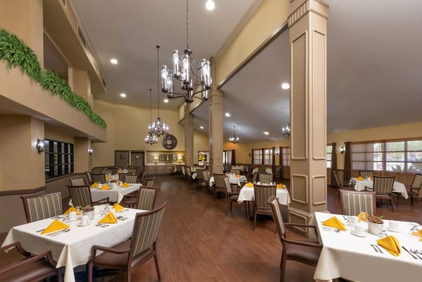 Dining area with tables set for a meal