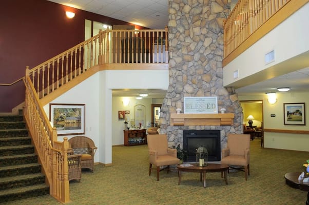 Welcoming common area with seating and fireplace