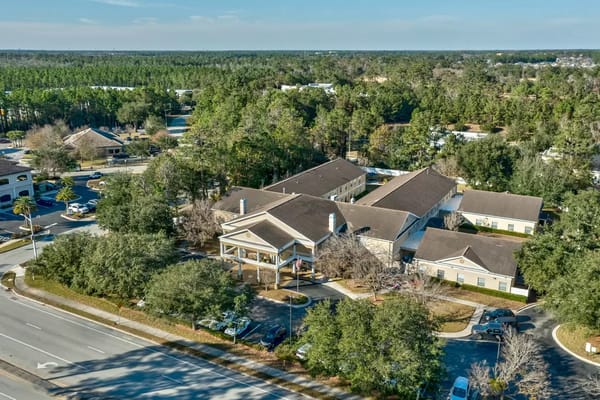 Aerial view of Discovery Commons San Pablo surrounded by greenery in Jacksonville, FL.