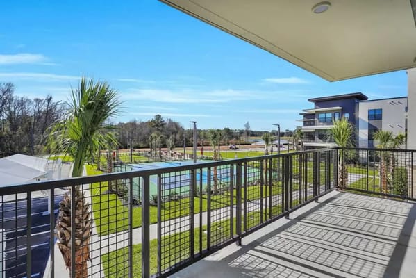 View of an outdoor area with pool and building