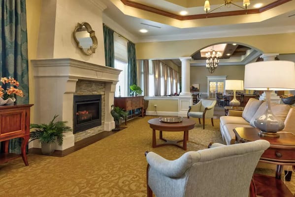 Cozy common area with seating and a fireplace