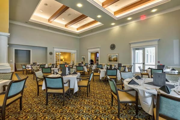 Dining room with tables set for a meal