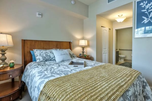 Cozy private bedroom with warm lighting