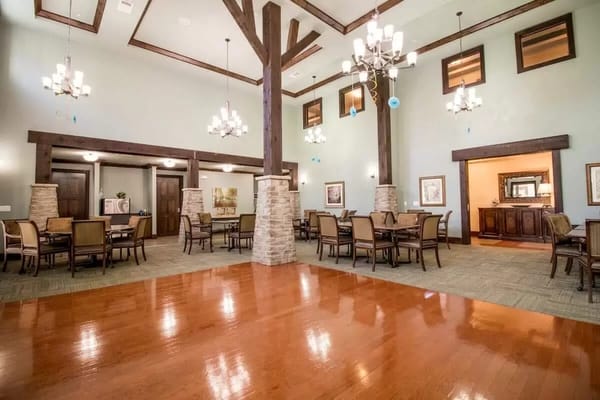 Interior view of a spacious dining room in a senior living facility