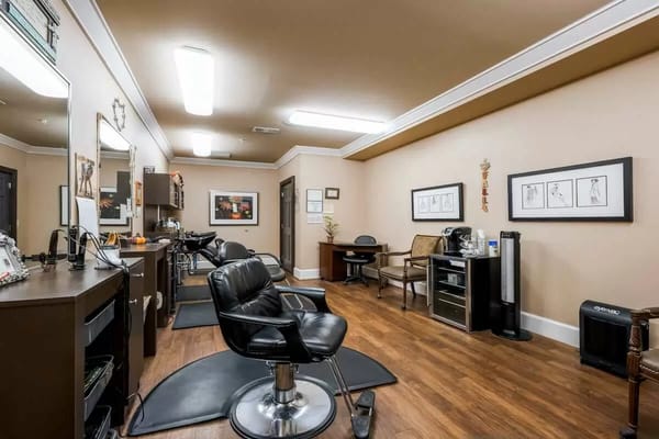 Interior view of a hair salon with styling chairs