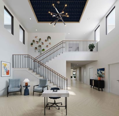 Spacious interior lobby with staircase and seating area