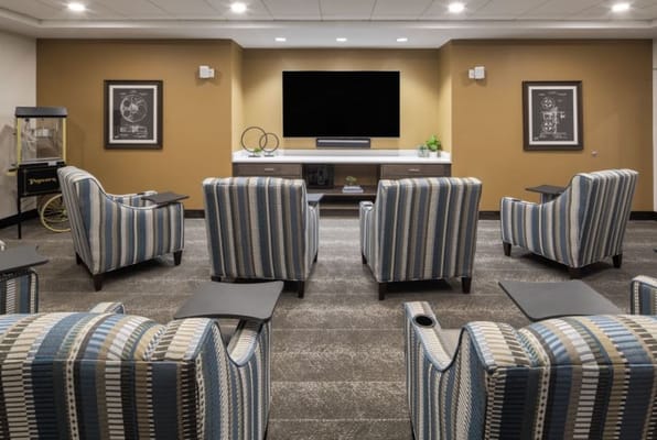 Cozy common area with comfortable seating and a TV