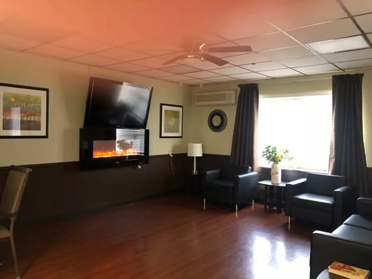 Cozy common area with comfortable seating and fireplace