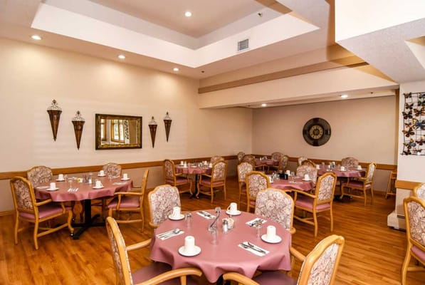 Dining area with tables set for meals