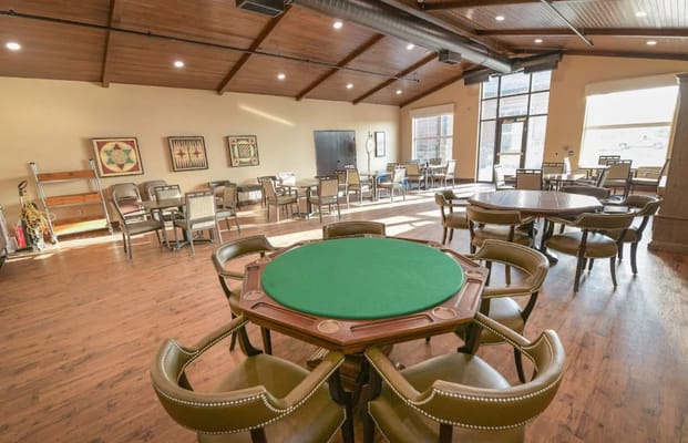 Interior view of a common area with poker tables