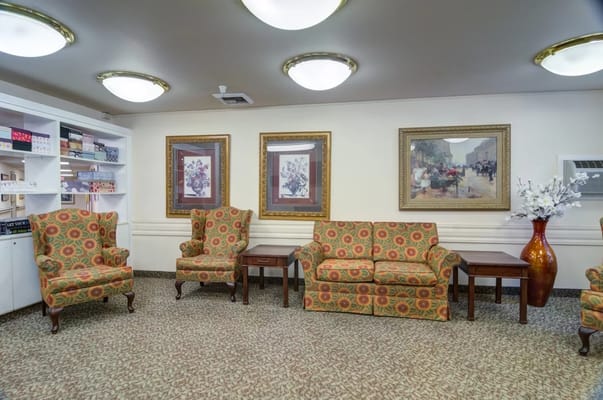 Common area with patterned seating and artwork