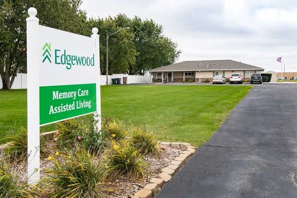 Exterior view of Edgewood Assisted Living facility sign and building