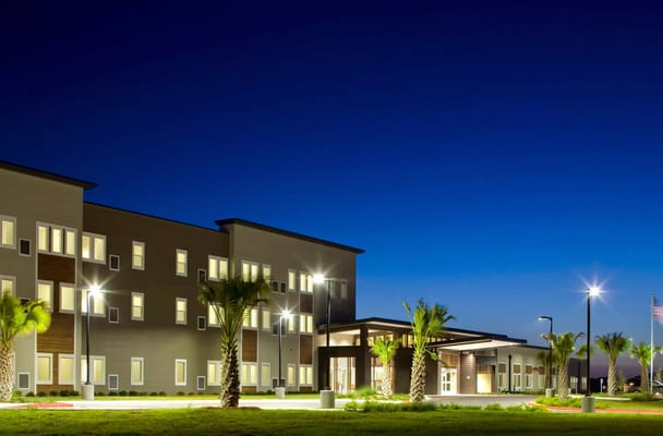 Exterior view of the facility at twilight