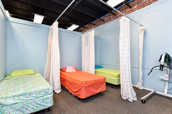 Interior view of shared resident bedrooms with beds