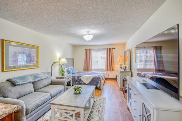 Cozy private room with living area and natural light