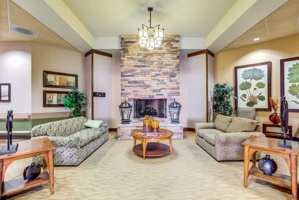 Cozy common area with comfortable seating and fireplace