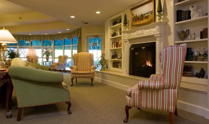 Cozy common area with comfortable seating and a fireplace