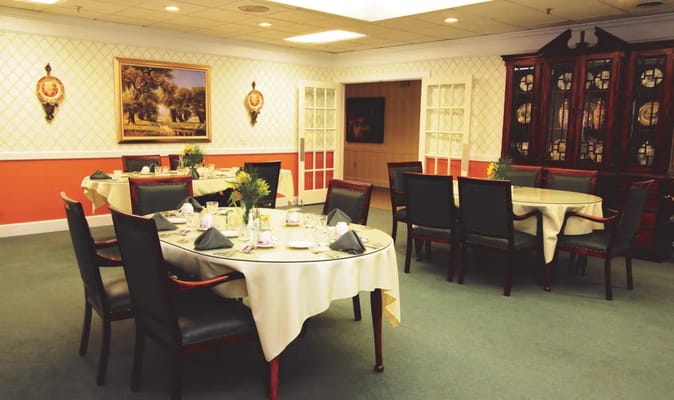 Dining area with tables set for a meal