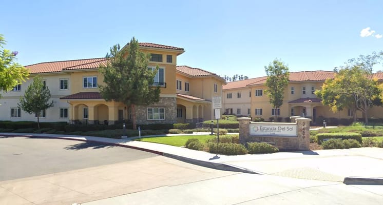Exterior view of Estancia Del Sol senior living facility
