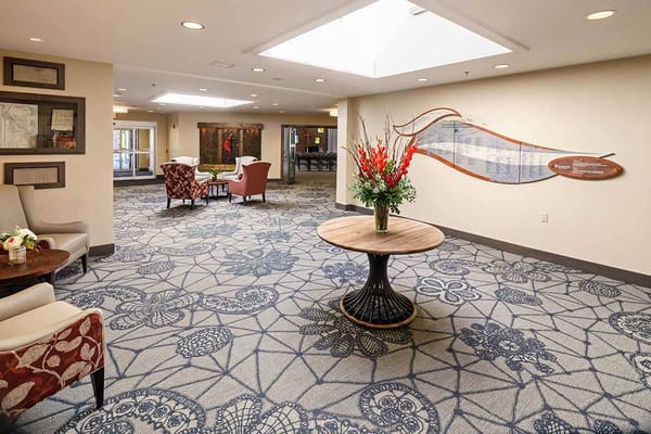 Common area with seating and floral decor
