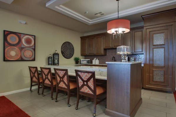 Interior view of a stylish kitchen area with seating