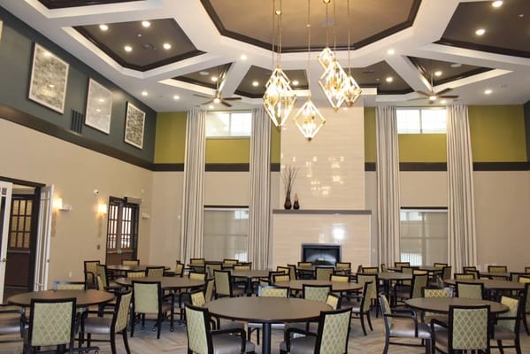 Spacious dining room with elegant decor and seating