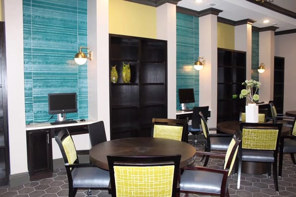 Bright common area with modern seating and decor