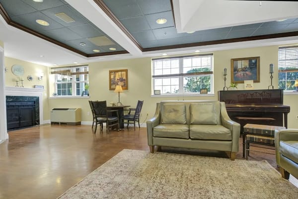 Interior common area with seating and piano