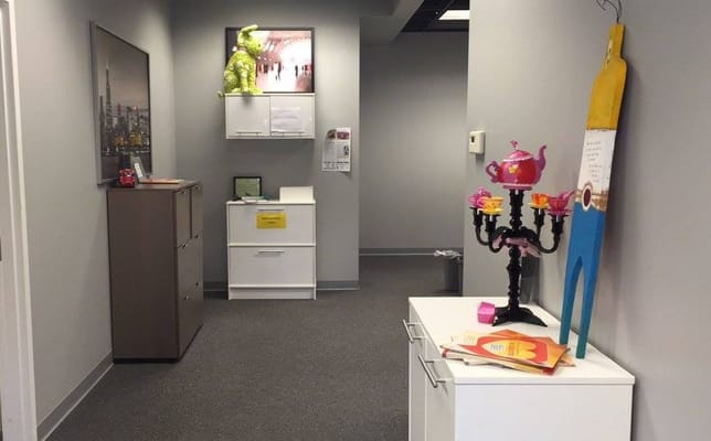 Brightly decorated office space with colorful decor elements.