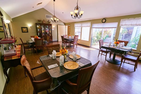 Dining area with tables set for a meal