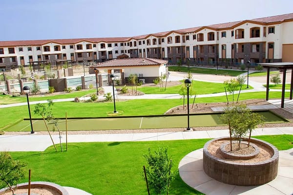View of a landscaped outdoor area in a senior living facility