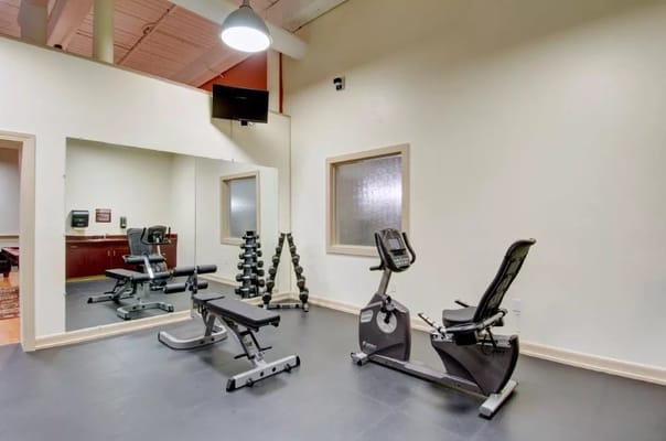 Interior view of a fitness area with exercise equipment