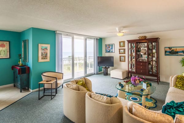 Bright interior of a cozy living room with ocean view